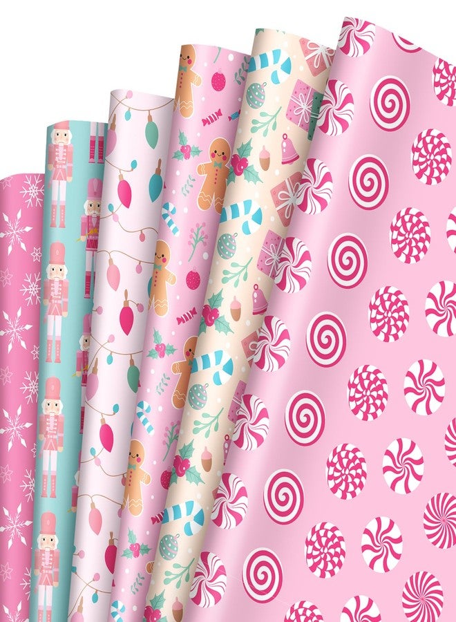 وولاين ورق تغليف هدايا عيد الميلاد من والين، ١٢ ورقة، وردي اللون - ليس لفة - ورق تغليف هدايا بتصميمات خبز الزنجبيل، كسارة البندق، وعصا الحلوى، مقاس ١٩.٧ × ٢٧.٦ بوصة مطوي بشكل مسطح، مثالي لتزيين حفلات أعياد الميلاد الشتوية، وحفلات استقبال المولود الجديد. - Image 1